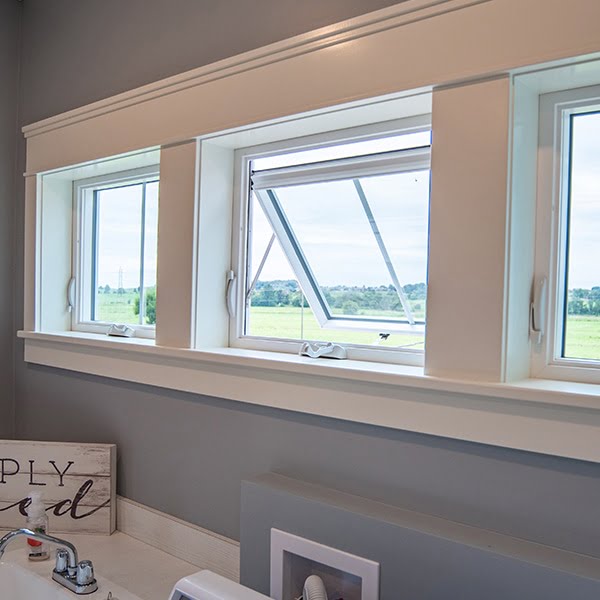 white awning windows in laundry room