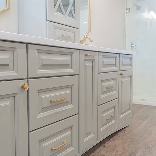 custom bathroom vanity with multiple drawers and doors