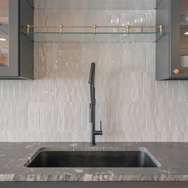 matte black faucet and sink and quartz countertop