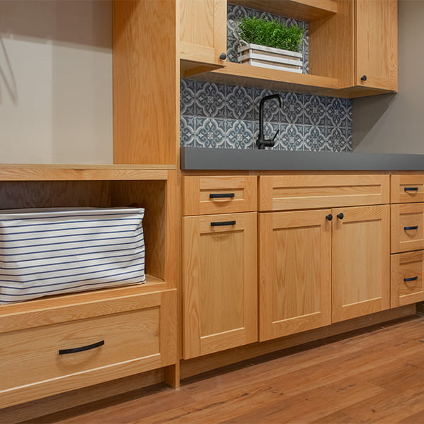 laundry room cabinets with light stain