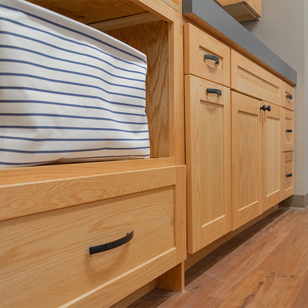 cloth basket on shelf of drop zone cabinetry