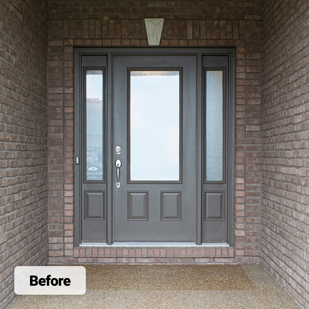 gray fiberglass door on ranch-style home