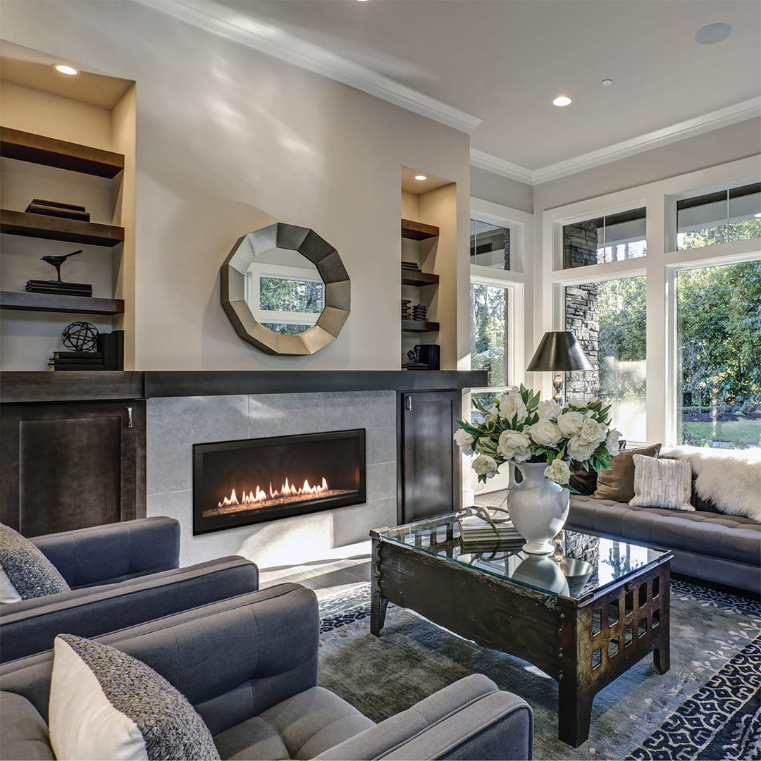 linear gas fireplace in chic parlor room