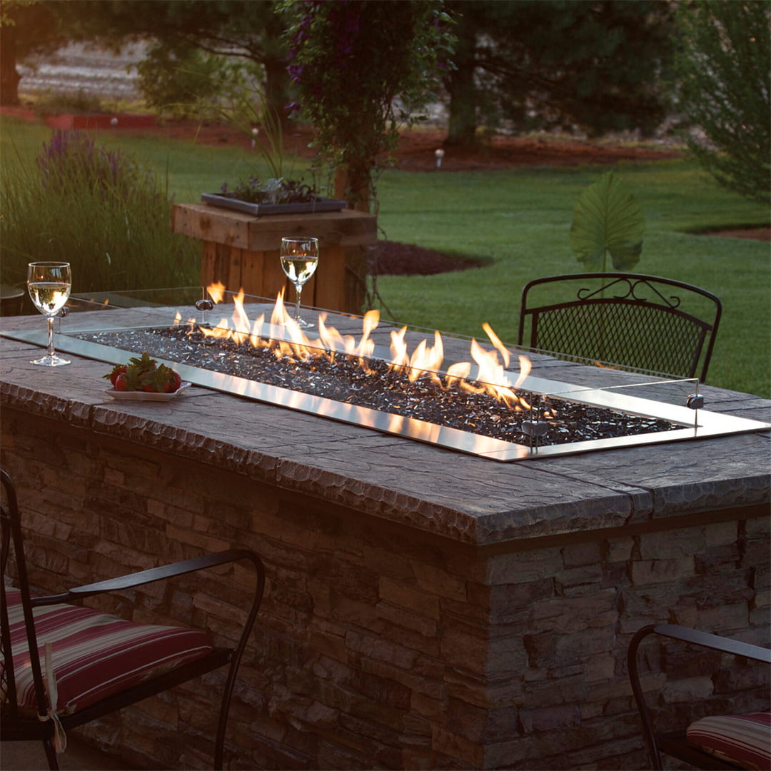 outdoor firepit on stone island on patio