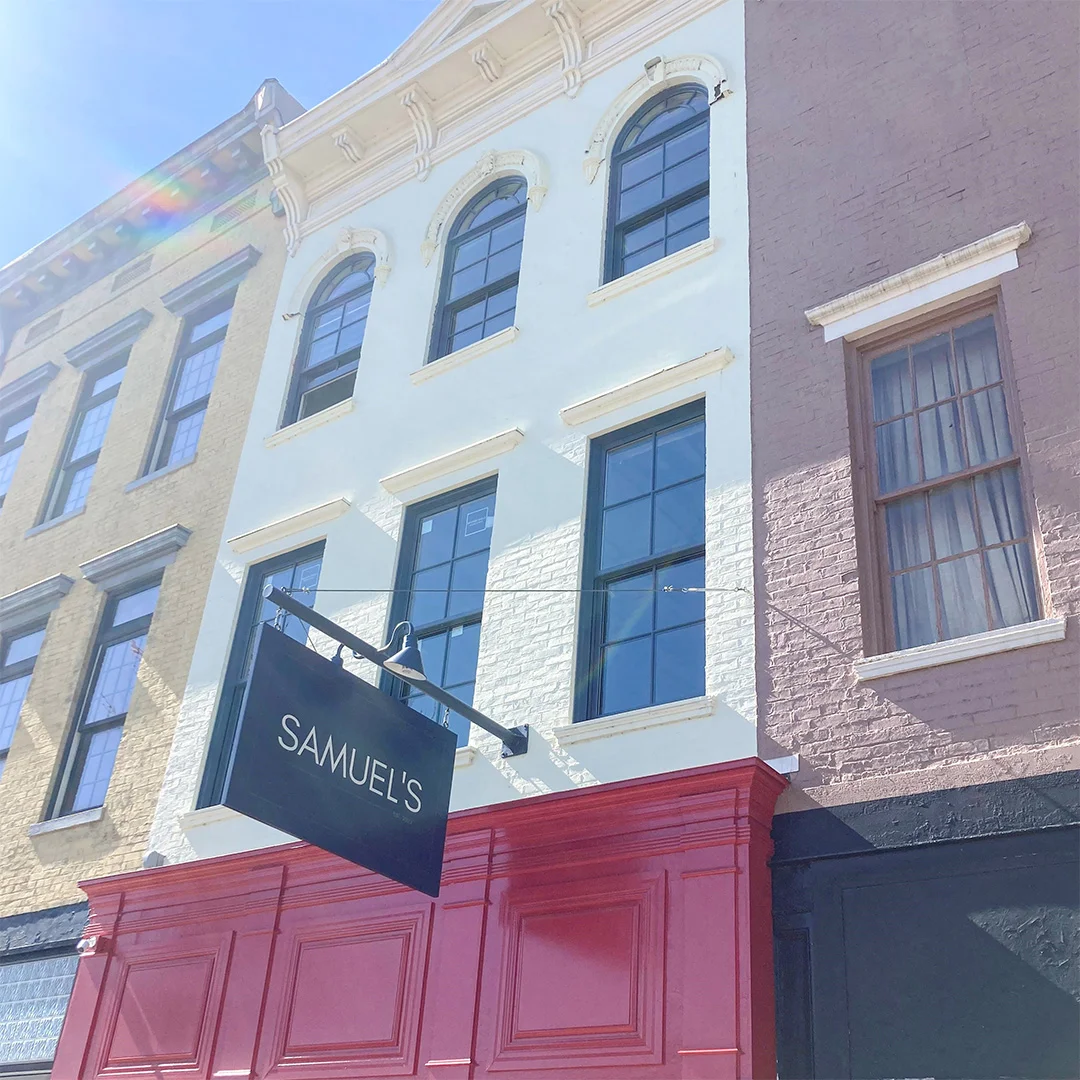 dark blue aluminum clad windows on historic building