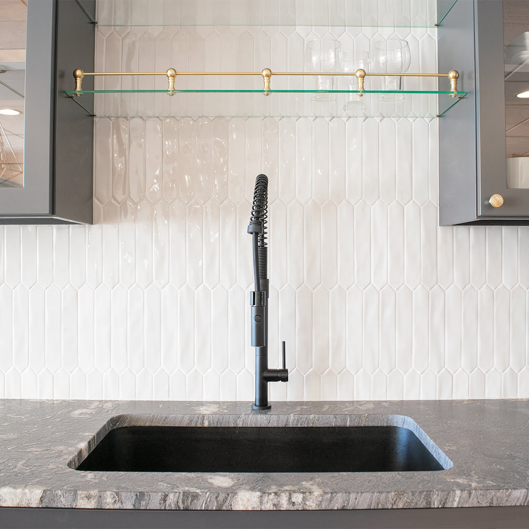 matte black faucet and sink and quartz countertop