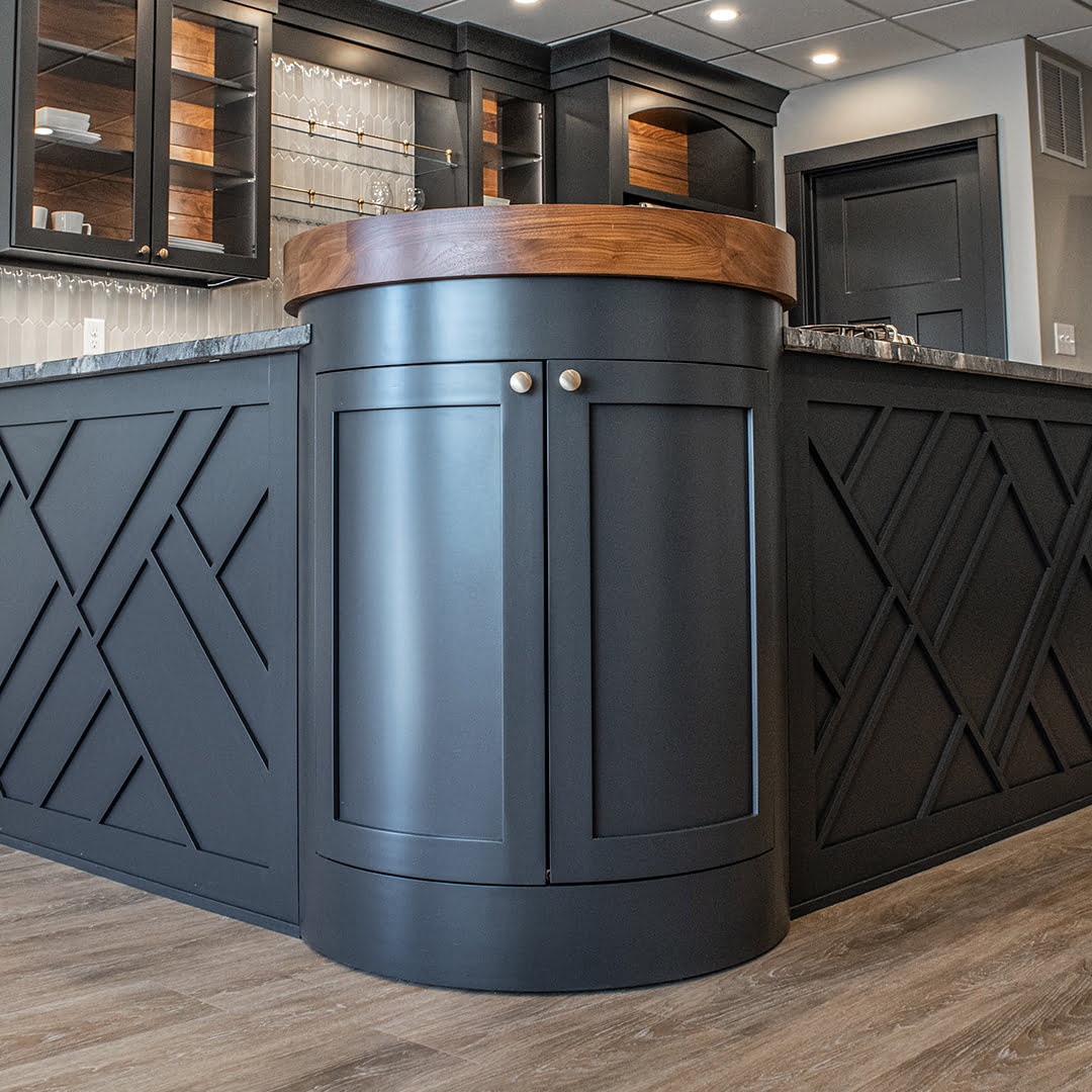 round gray kitchen peninsula cabinet with wood top