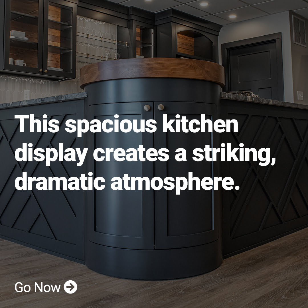 this spacious kitchen display creates a striking dramatic atmosphere