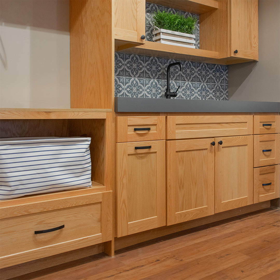 laundry room cabinets with gray countertop