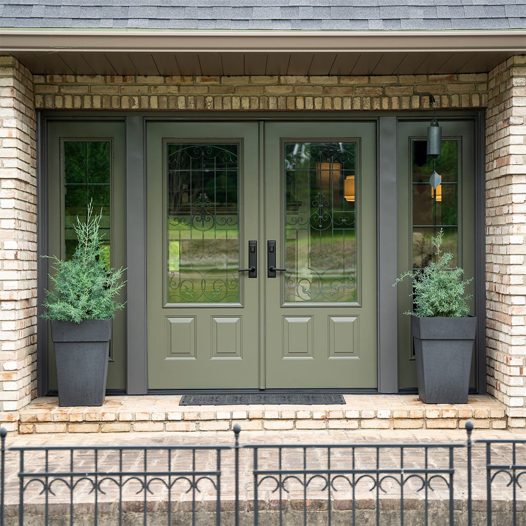 green french doors with decorative glass windows