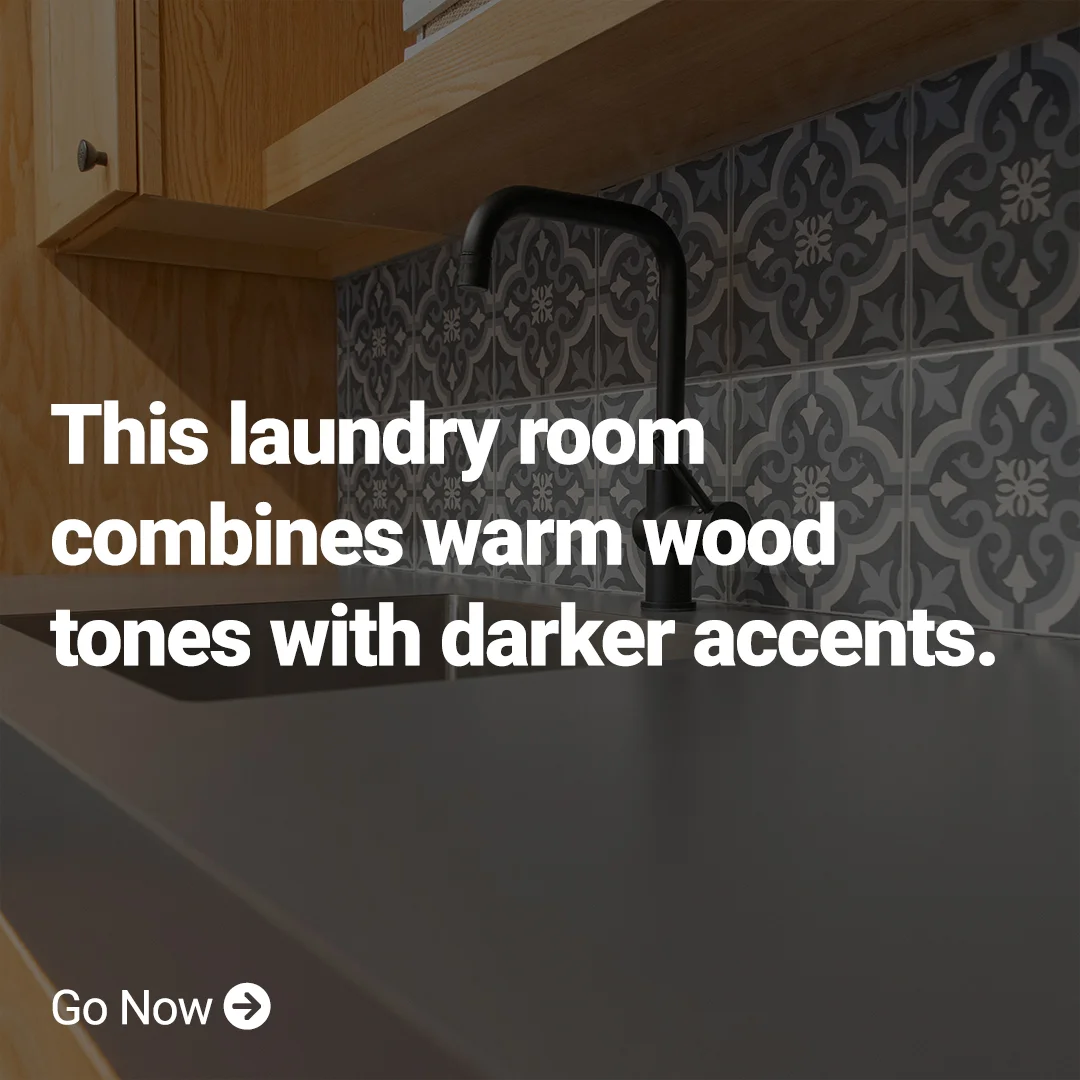 this laundry room combines warm wood tones with darker accents