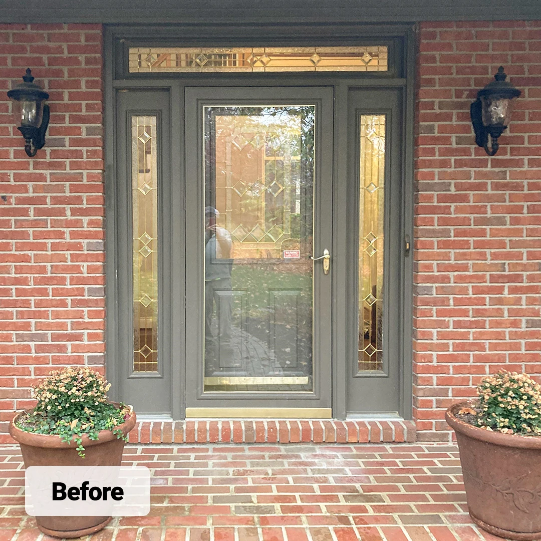 gray entry door system with storm door, side lights and transom