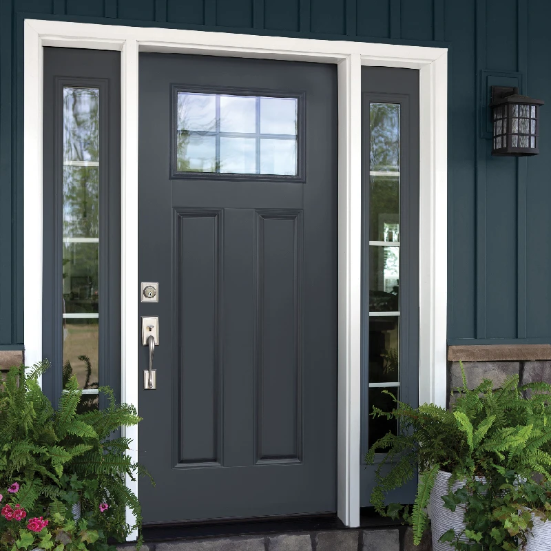 black steel door on modern home